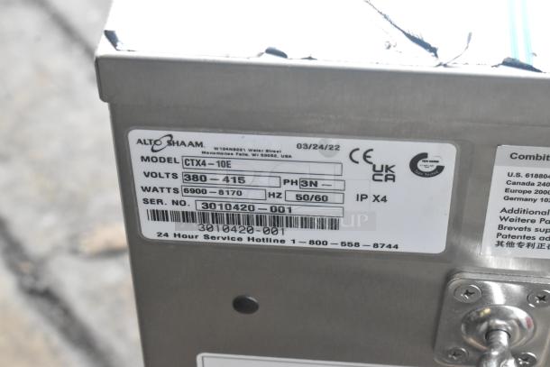 Alto Shaam CTX4-10E combi oven label, showing model, voltage (380-415V), wattage (6900-8170W), and serial number.