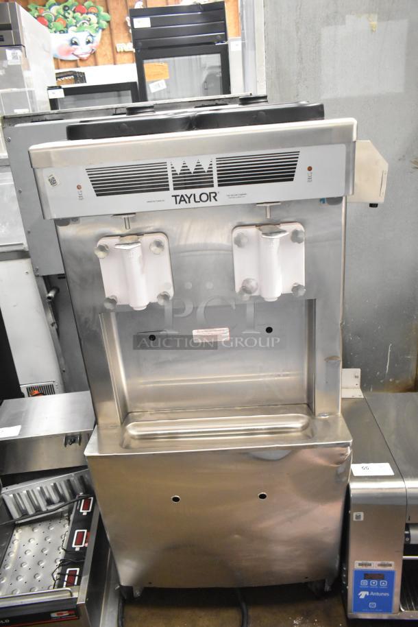 2021 Taylor 359-33 soft serve machine, two flavors, air-cooled, commercial casters, 208-230V, 3 phase, excellent condition.