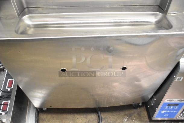 2021 Taylor 359-33 commercial soft serve ice cream machine, two-flavor, air-cooled, on casters, 208-230V, 3 phase.