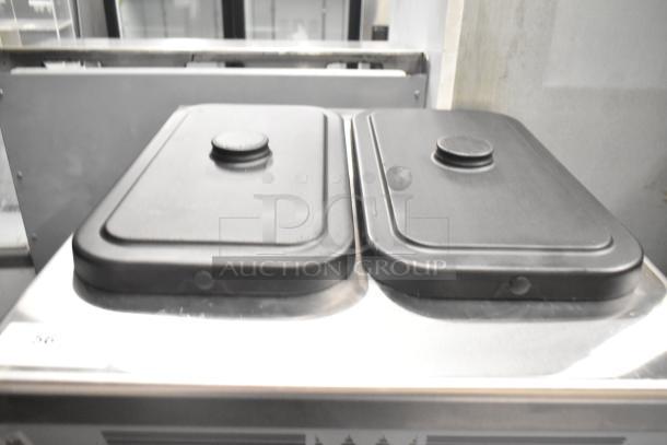 2021 Taylor 359-33 air-cooled soft serve machine, dual flavor, commercial casters, 208-230V, 3-phase.