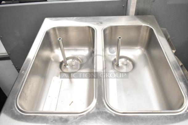 2021 Taylor 359-33 soft serve ice cream machine. Stainless steel, two-flavor, air cooled, on commercial casters.