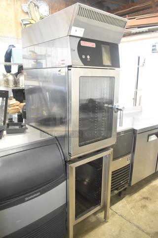 Blodgett BLCT10E stainless steel commercial combi convection oven with ventless hood on stand; 440/480V, 3-phase, excellent condition.