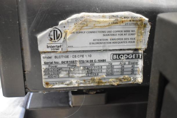 Blodgett BLCT10E stainless steel combi convection oven, ventless hood, on equipment stand, model tag visible, 440/480 volts, 3 phase.