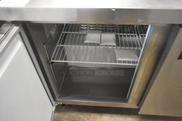 Avantco 178AWT48FHC stainless steel 2-door work top freezer. Commercial casters, 115V, 1 Phase. Internal shelving detail shown.