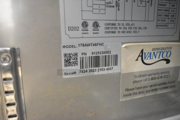 Avantco 178AWT48FHC stainless steel 2-door work top freezer on casters, 115V, 1 phase. Visible label details model and serial numbers.