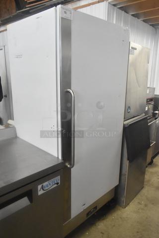 Arctic Air R22CWF6 single door reach-in cooler on commercial casters, 115 volts, 1 phase, with stainless steel handle.