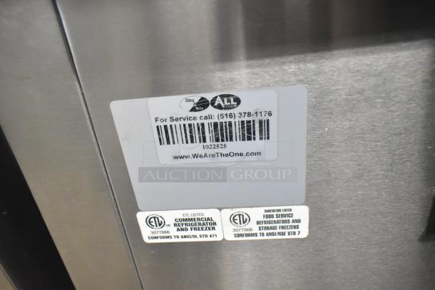 Commercial 2 Door Back Bar Cooler with casters, ETL certified, includes service contact info label and certification labels.