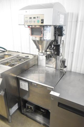 Ricemini RM-401AG commercial rice washing machine, metal floor style, 100V, 1 phase, in good condition. Controls and labels visible.