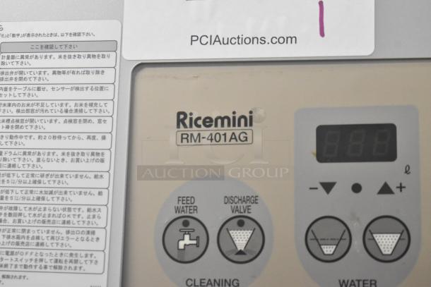 Ricemini RM-401AG rice washing machine; metal commercial floor style; controls and branding visible; 100V, 1 phase.