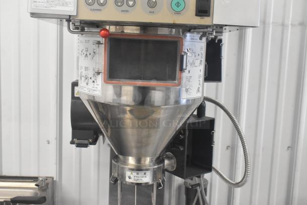 Ricemini RM-401AG Metal Commercial Rice Washing Machine, 100V, 1 Phase, with control panel and labels, in good condition.