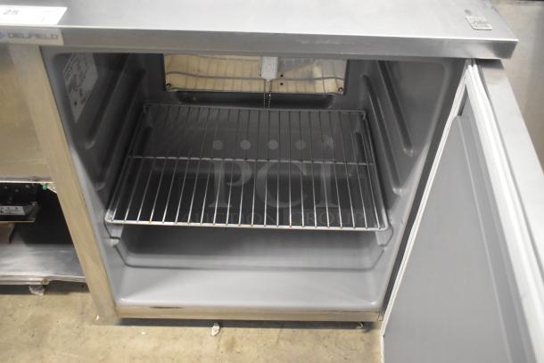 2019 Delfield 406P-STAR2 single door undercounter cooler, stainless steel, commercial casters, 115V, 1 phase, open door view.