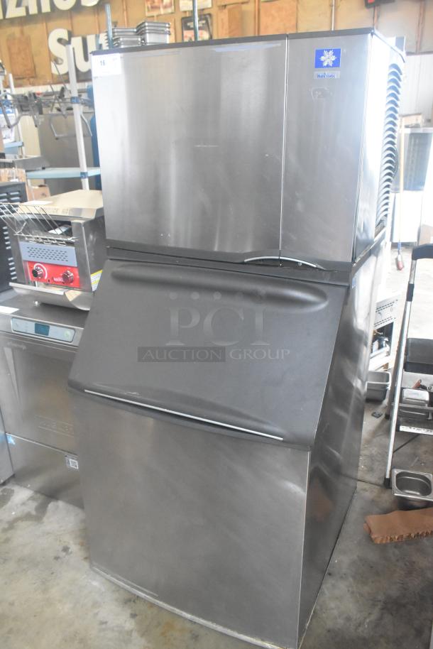 Manitowoc SD0602A ice head on B570 ice bin, stainless steel, 208-230V, 1 phase, in good condition, commercial use.