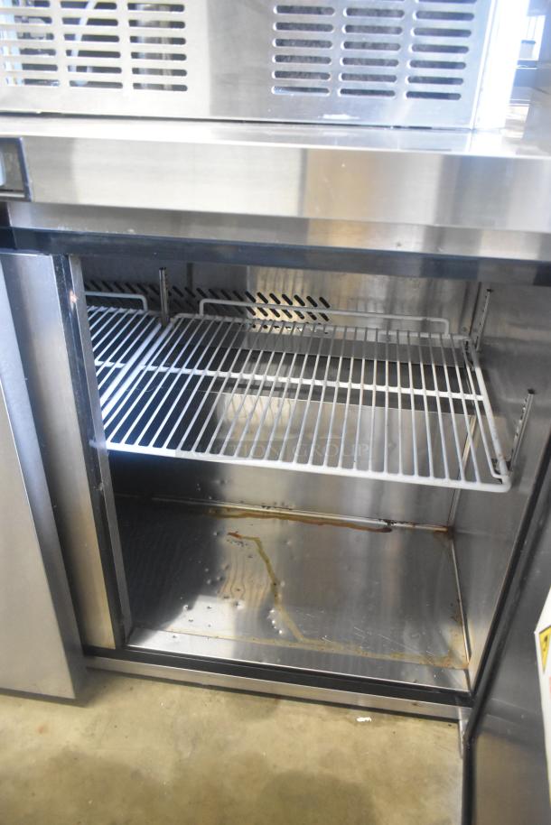 2021 Atosa MGF8406GR commercial 2-door undercounter freezer. Stainless steel, 115V, 1 phase, slight wear inside.