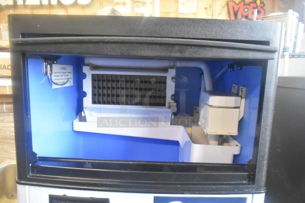 2023 Coldline ICE80-HA undercounter ice machine, self-contained, 115V, 1 phase. Interior view showing cooling components.