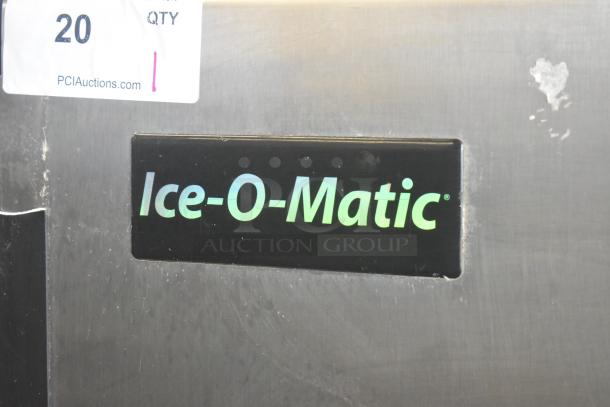 Ice-O-Matic ICE0400FW4 stainless steel commercial ice machine, 115V, 1 phase, on Ice-O-Matic B40PSB bin, logo visible.