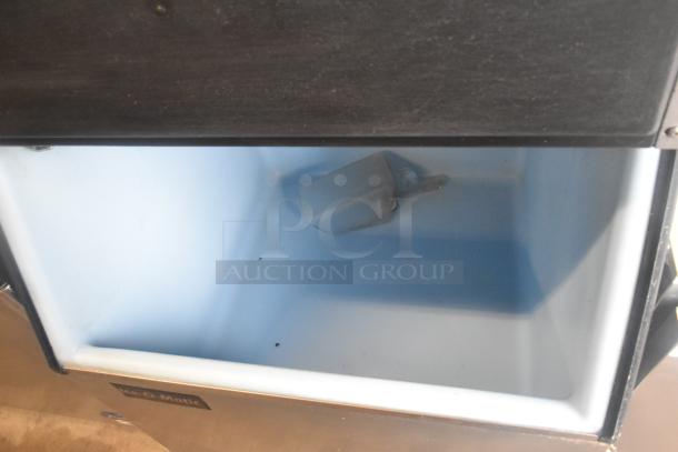 Ice-O-Matic ICE0400FW4 stainless steel ice machine head on B40PSB bin, 115V, 1 phase, visible interior with scoop included.