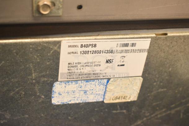 Model and serial tags on Ice-O-Matic B40PSB ice bin indicating manufacturer and certifications.