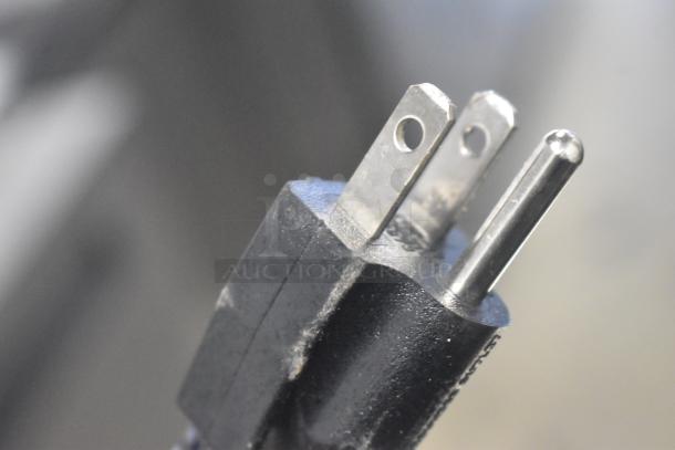Close-up view of a three-prong power plug for the 2024 Bunn CW15-APS Commercial Coffee Machine, 120 Volts.