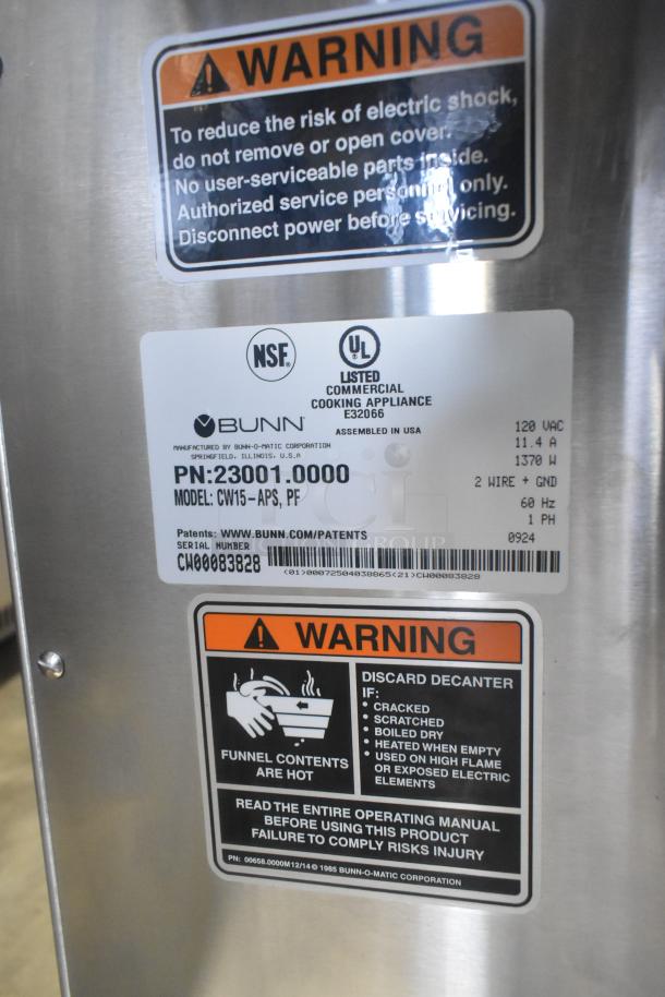 2024 Bunn CW15-APS commercial coffee machine, 120V, 1 Phase. Stainless steel with safety and usage labels visible.