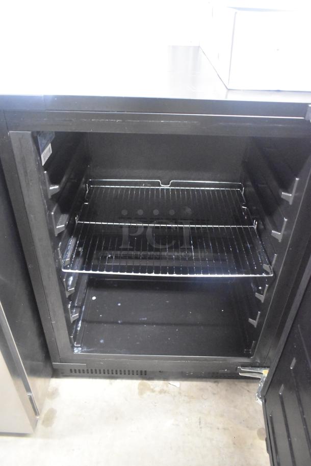 Summit ALFZ53 undercounter freezer, single door, frost-free, 115V, 1 phase, in good condition with visible shelving.