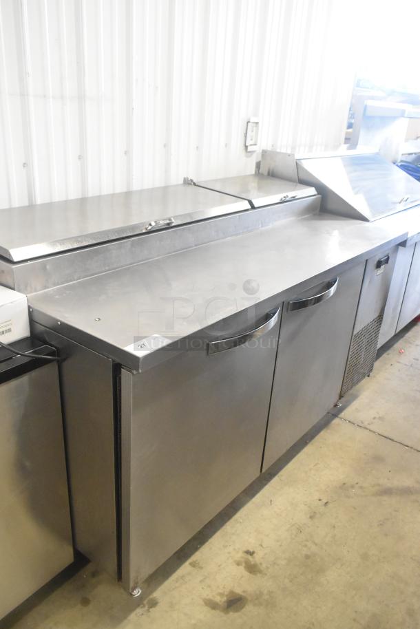 2019 True TPP-67 stainless steel commercial pizza prep table, on casters, 115V, 1 phase, excellent condition.