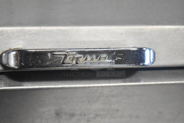 2019 True TPP-67 stainless steel pizza prep table with commercial casters, 115V, 1 phase. True logo visible.