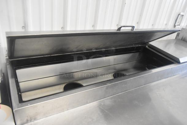 2019 True TPP-67 stainless steel pizza prep table, commercial casters, 115V, 1 phase, excellent for restaurant use.