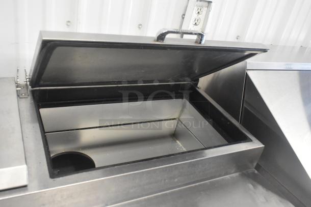 2019 True TPP-67 stainless steel pizza prep table with open lid, commercial casters, 115V, 1 phase, excellent condition.