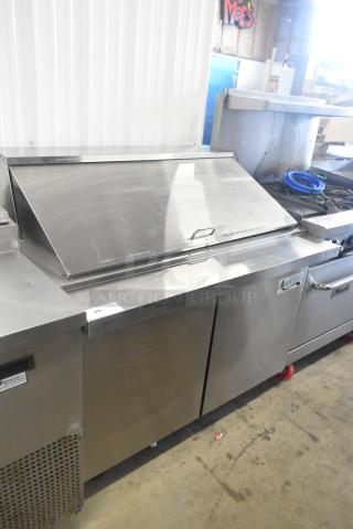 Avantco 178SSPT48MHC stainless steel prep table, mega top, commercial casters, 115V, 1 phase, used condition.