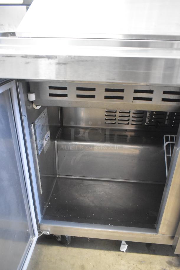 Avantco 178SSPT48MHC stainless steel commercial sandwich salad prep table, bain marie mega top, on casters, 115V, 1 Phase.