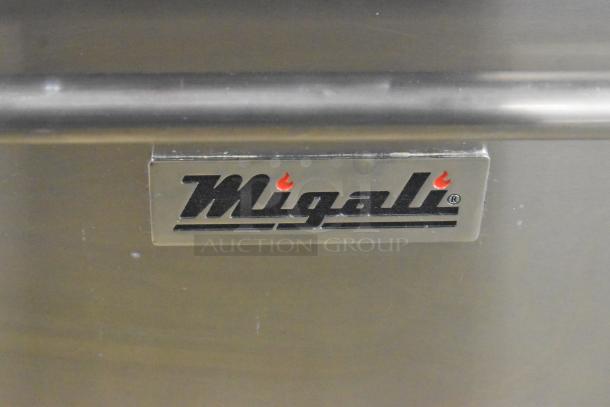 Migali C-RO4B-12GL-NG label on commercial gas range with 4 burners, griddle, oven, on casters.