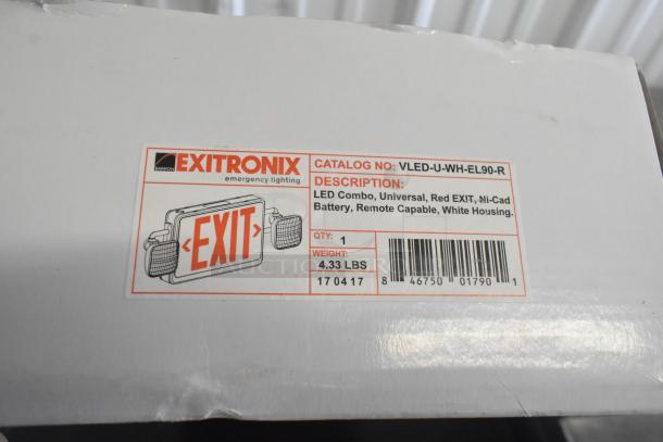 Exitronix VLED-EL90 exit sign in original packaging. LED combo, red EXIT, Ni-Cad battery, remote capable, white housing.