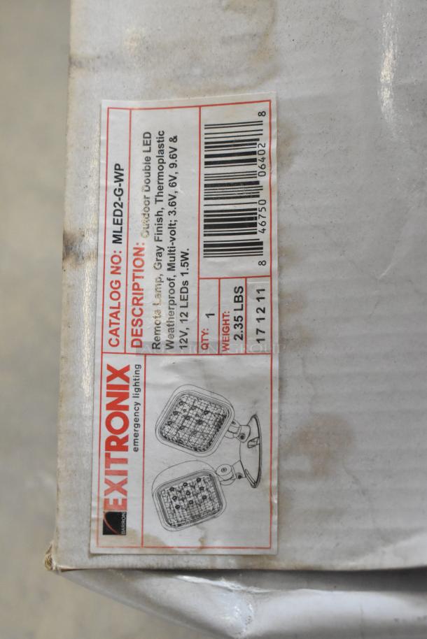 Exotronix MLED2-G-WP LED emergency light, 12V, waterproof, 2.35 lbs. New scratch and dent condition, catalog label visible.