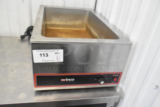 Winco FW-S500 commercial countertop food warmer, stainless steel, 120 volts, with adjustable heat settings. Auction tag 113.