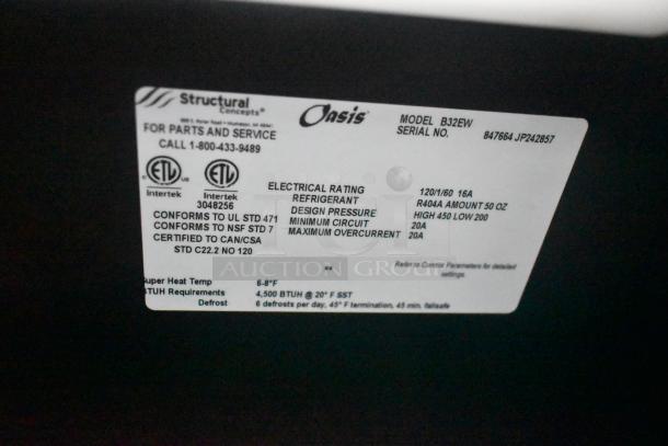 Structural Concepts Oasis B32EW tag showing model info, serial number 847664 JP242857, electrical specs, and certifications.