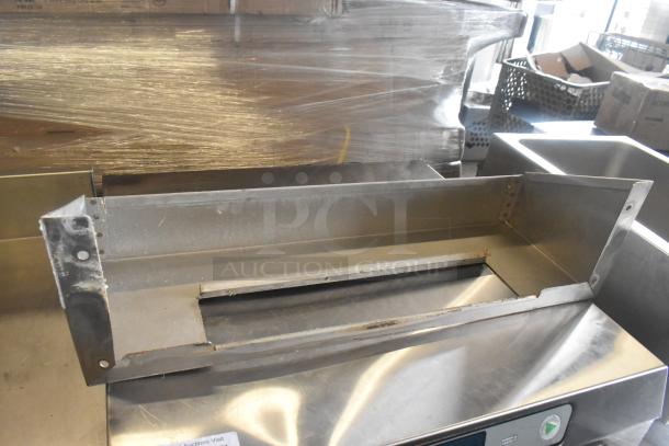 Champion Commercial Conveyor Dishwasher, 208V, 3 Phase. Stainless steel structure, surface marks visible.