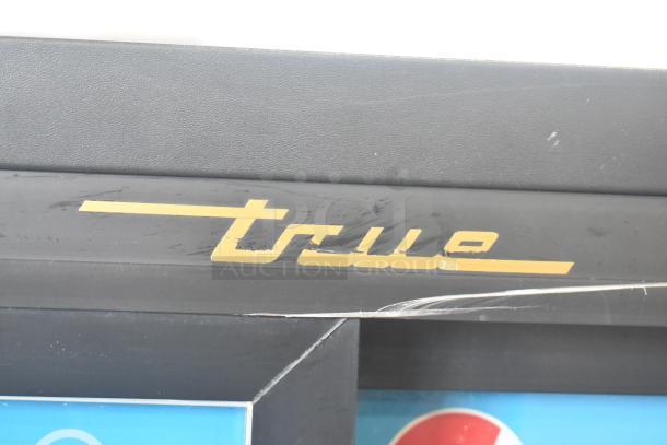 True GDM-41SL-60-LD cooler, displaying the brand logo. Two-door reach-in style, 115 volts, 1 phase.