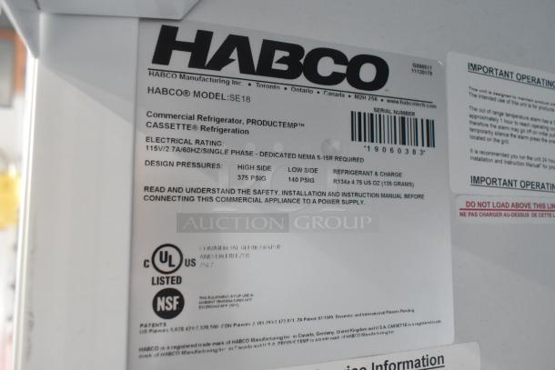 2019 Habco SE18 commercial cooler label showing electrical rating, refrigerant type, and safety certifications.