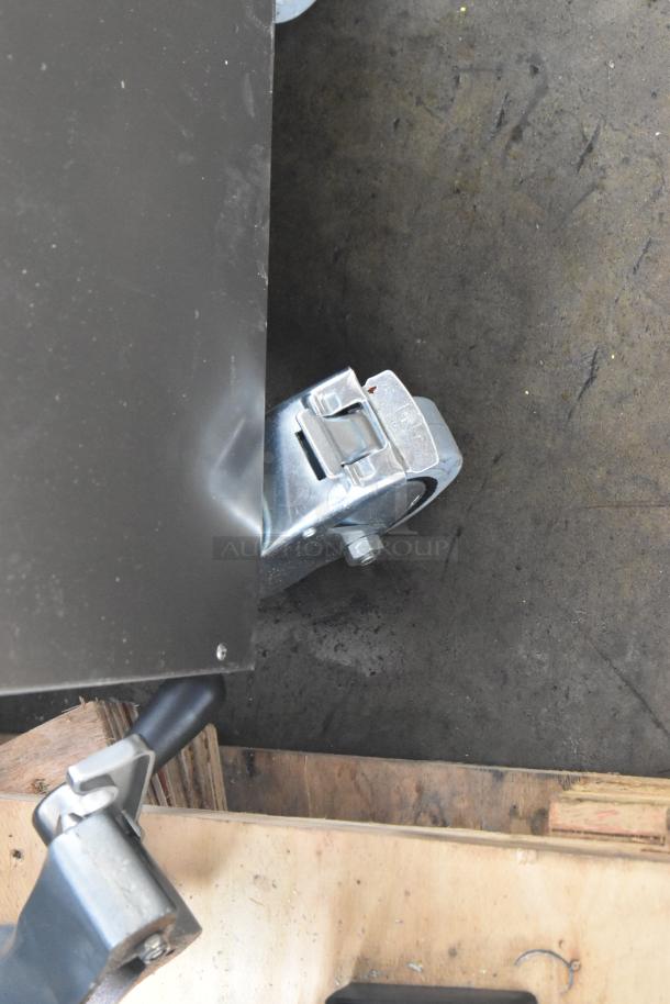 Brand new Vito VITO XL fryer oil filter system; minor scratches; mounted on commercial casters; 100-120V, 1 Phase.