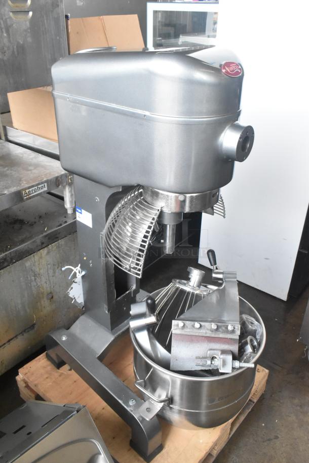 Brand new Avantco MX40H dough mixer with bowl, guard, paddle, whisk, and dough hook. Scratch and dent condition.