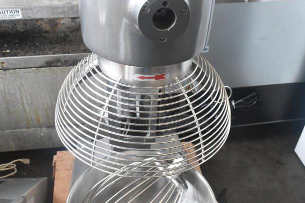 Brand new Avantco MX40H commercial dough mixer with bowl guard, paddle, whisk, and dough hook attachments. Minor scratches.