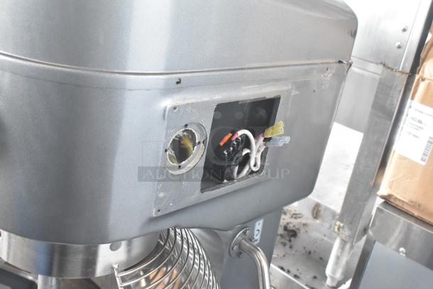 Avantco MX40H commercial dough mixer, new with visible scratches and exposed wiring, includes bowl and attachments.