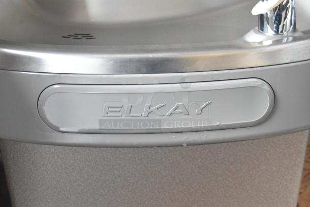 BRAND NEW Elkay EZFSD_1H wall mount water fountain. Stainless steel finish, 115V, 1 phase. Minor scratches visible.