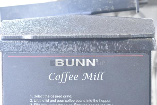 Bunn G3 HD coffee grinder; black; scratch and dent; 3 lb. capacity; instruction label visible.