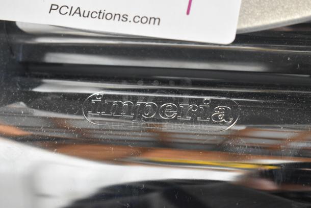 BRAND NEW Imperia NSP Countertop Pasta Machine, visible logo, scratch and dent condition, PCI Auctions tag included.