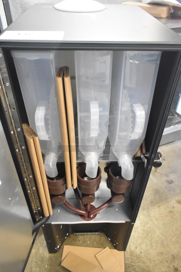 BRAND NEW Avantco 177PBD3 cappuccino machine with three 3.7 lb. hoppers, minor scratches, dent on exterior.