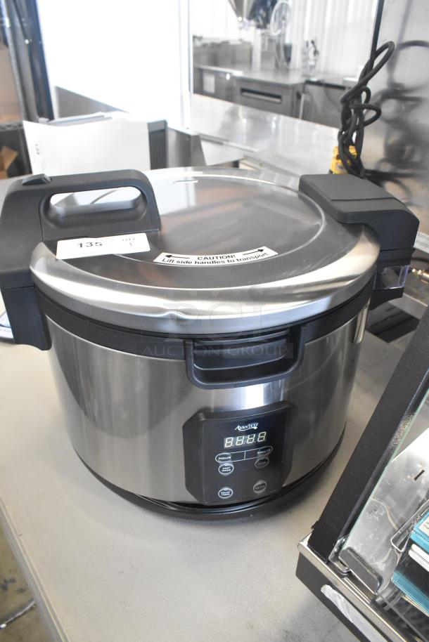 Brand new Avantco 177RCSB90 digital rice cooker, 90 cup capacity, stainless steel, scratch and dent, hinged lid, 240V.