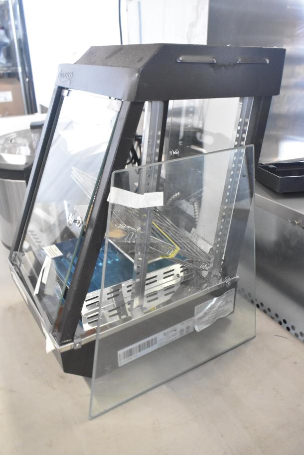 Brand new Avantco 177HDC13 heated display case, 3 shelves, hinged doors, 15" countertop, scratch and dent, 120V, 1 phase.