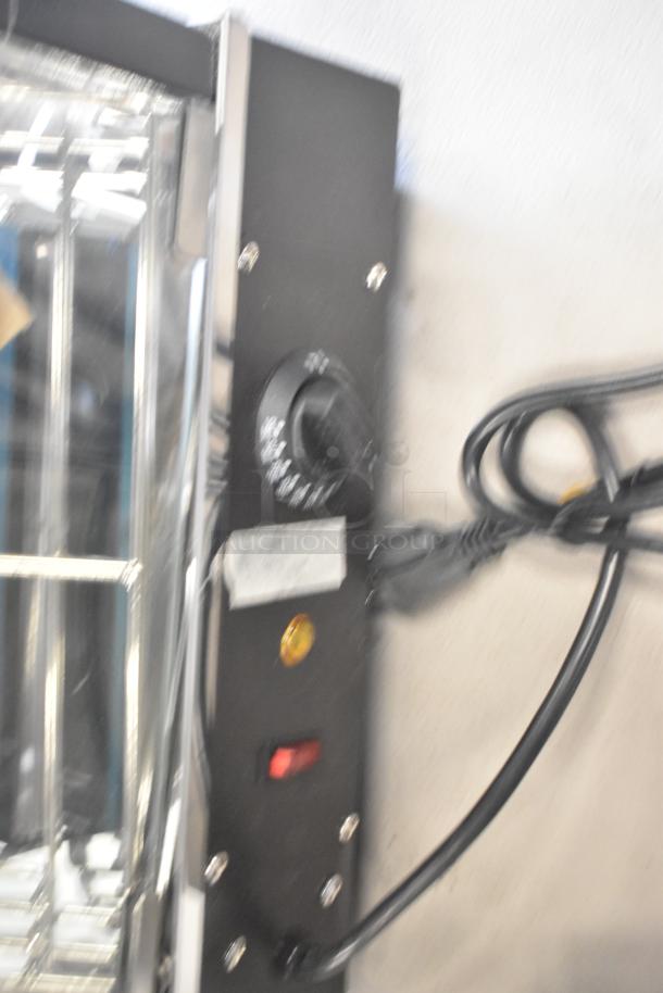 Brand new Avantco 177HDC13 Countertop Heated Display Case control panel. Features temperature dial and power switch.