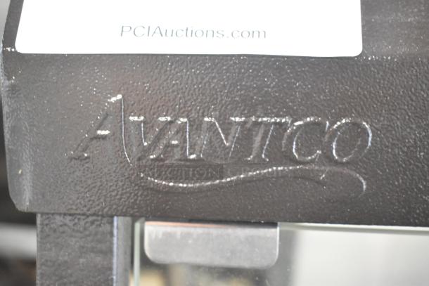 Brand new Avantco 177HDC13 heated display case, three shelves, hinged doors, 120V, visible embossed Avantco logo.